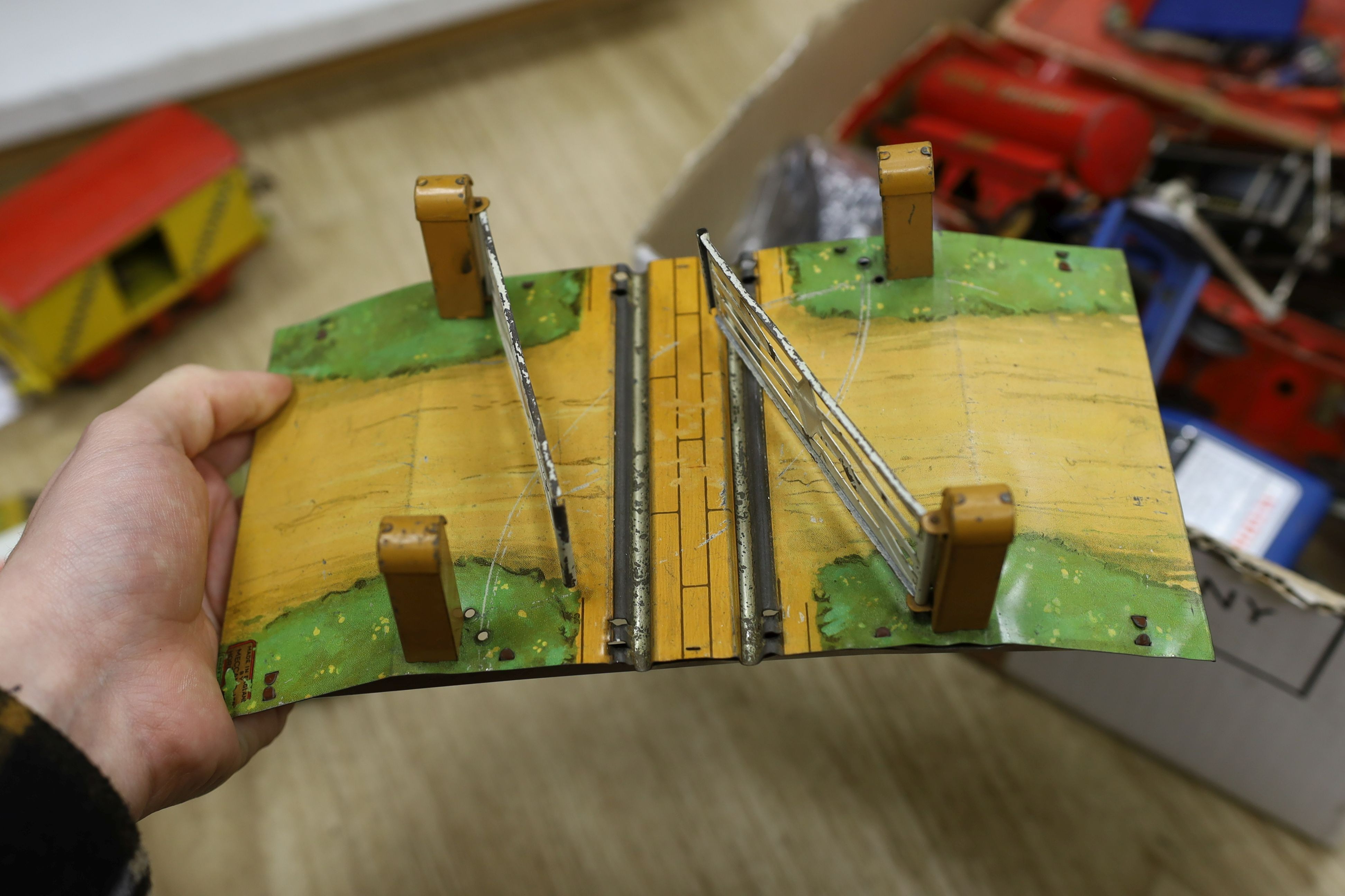 A mixed quantity of Hornby model railway track, a metal crossing, an engine and other items